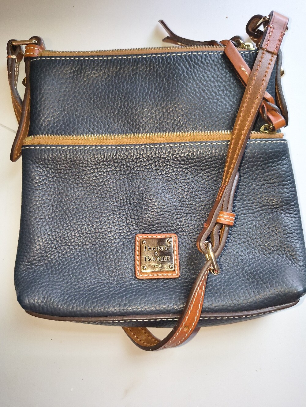 Dooney & Bourke Navy Leather Messenger Bag with Brown Trim